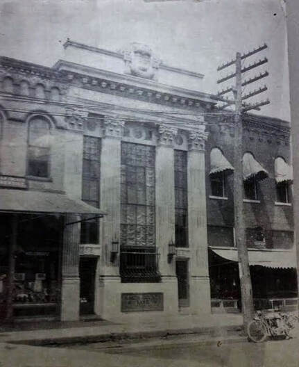 Historic photo of the building around 1900